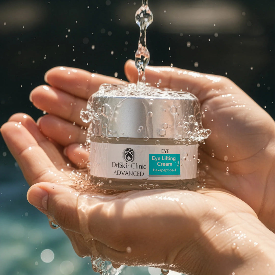 Hand holding a jar of DySkinClinic Advanced Eye Lifting Cream with water droplets.